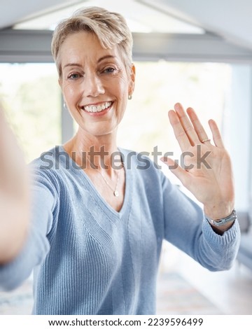 Portrait, senior woman and wave for video call, communication and social media. Mature female, hand gesture and greeting with smile, hello or goodbye for connection, recording or facetime for talking