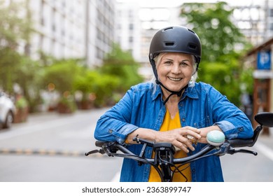 Portrait of senior woman wearing helmet while riding bicycle in the city
 - Powered by Shutterstock
