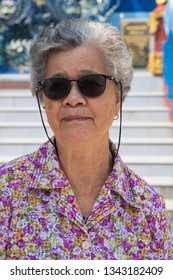 old woman sunglasses