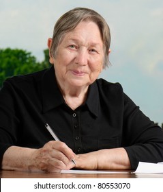 Portrait Of  Senior Woman  Writing