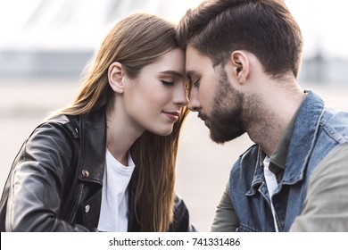 Portrait Of Sensual Young Couple In Love With Eyes Closed