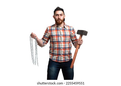 Portrait of serious bearded man in cap and checked shirt, holds hammer and chain in hands while looking at the camera on white background. 