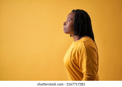 portrait of a serious black woman seen from the side