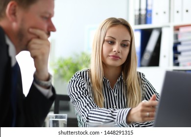 Portrait of serious concentrated lady. Beautiful woman discussing about contract with shareholder in international company. Biz concept. Blurred background - Shutterstock ID 1448291315