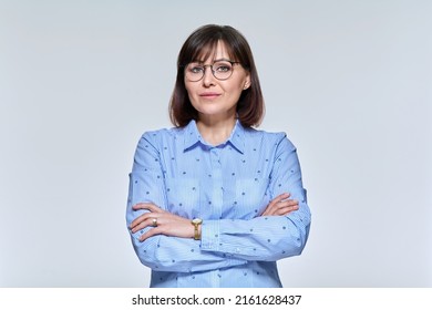 Portrait Of A Serious Confident Mature Woman Looking At The Camera