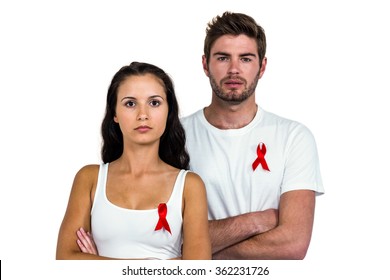 Portrait Of Serious Couple With Arms Crossed On White Background