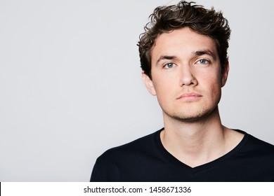 Portrait Of Serious Handsome Man In Studio