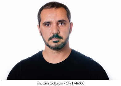 Portrait Of Serious Man On White Background