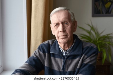 Portrait of a serious nice old man, 80 years old, looking at the camera. - Powered by Shutterstock