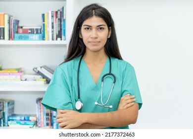 Portrait Of Serious South American Female Nurse Or Doctor At Hospital