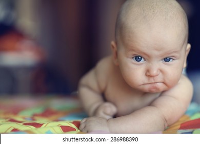 portrait serious stern baby - Shutterstock ID 286988390
