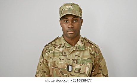 A portrait of a serious young african american man in military uniform, isolated against a white background. - Powered by Shutterstock