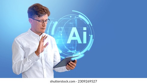 Portrait of serious young European businessman using tablet computer with double exposure of AI artificial intelligence interface over light blue background. Concept of machine learning. Copy space