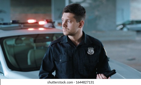 Portrait Serious Young Man Cops Stand Near Patrol Car Look At Camera Enforcement Background His Colleague Happy Officer Police Uniform Auto Safety Control Policeman Close Up Slow Motion