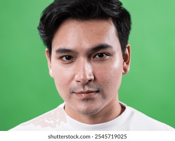 Portrait of a serious young man green screen studio photography indoor close-up personality expression - Powered by Shutterstock