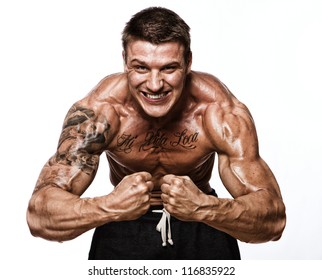 Portrait Of Sexy Muscle Man Posing In Studio