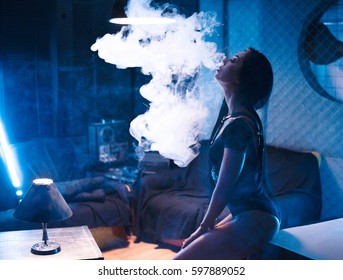 Portrait Of Sexy Woman In Lingerie Vaping E-cigarette , Vape Mod Concept