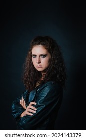 Portrait Of Sexy Young Woman Posing In Black Jacket And Jeans. High Quality Photo