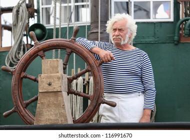 Portrait Of A Ship Captain With Gray Hair