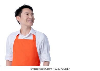 Portrait Of Shop Owner Asian Male Business Entrepreneur Small Business Wear Orange Apron Smile And Happiness And Confident Isolate White Background