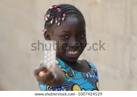 Portrait Shot of African Black Girl With Medicine