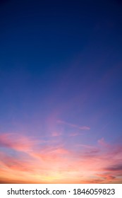 A portrait shot of beautiful pink clouds in a blue peaceful sky during sunset. - Shutterstock ID 1846059823