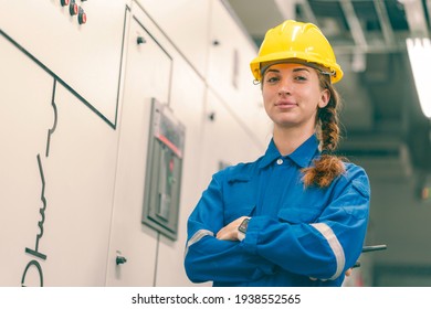 Portrait Shot Half Body Of Young Female Electrical Engineer In Electrical Control Room Looking Confident Showing The Good Services And Professional Concept