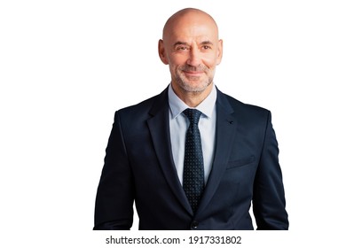 Portrait shot of smiling middle aged businessman wearing suit and tie while standing at isolated white background and looking away. Copy space.