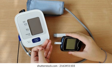 Portrait Showing Blood Pressure And Monitor Gauge Equipment Medical Of Patient, Concept Health Care.