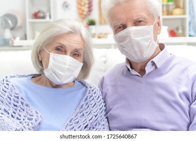 Portrait Of Sick Elderly Woman And Man With Facial Masks