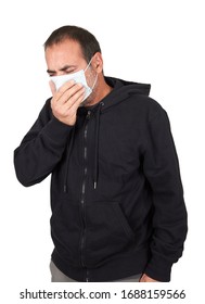 Portrait of a sick man wearing medical mask on white background