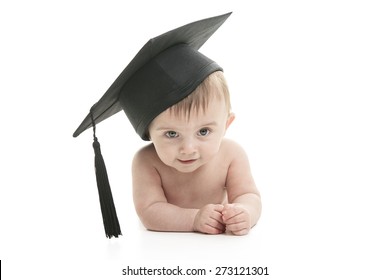 A Portrait of a sitting baby with a graduation cap