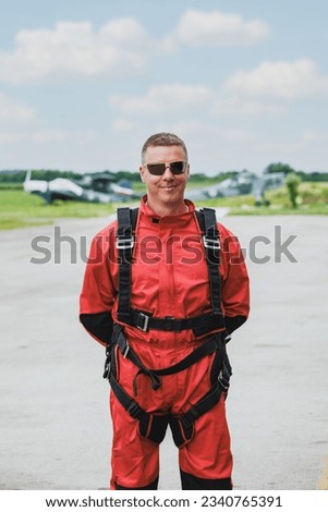 Portrait of a skydiver getting ready for tandem skydiving jump. ストックフォト © 