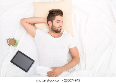 Portrait Of A Sleeping Man From Above With Coffee. 