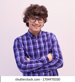 Portrait  Of Smart Looking Arab Teenager With Glasses Wearing A Hat In Casual School Look Isolated On White Copy Space