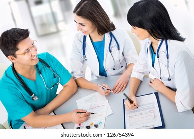 Portrait of a smart young doctors works in a hospital - Shutterstock ID 126754394