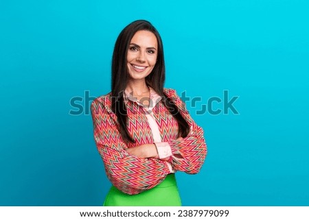 Portrait of smile boss woman folded hands toothy smile posing confident fashion designer in trend clothes isolated on cyan color background