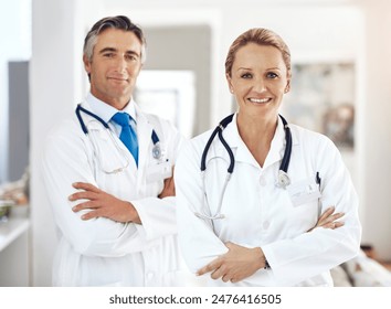 Portrait, smile and medical team in hospital for healthcare, professional and people in lobby. Mature doctors, support and about us in corridor for cardiology, medicare and expertise in clinic - Powered by Shutterstock