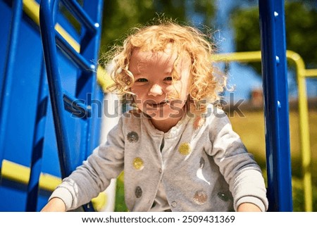 Similar – Image, Stock Photo Blond little child is traveling with family by ferry or ship. Schoolboy is admiring the landscape of the Adriatic Sea. Cruise during the holidays.