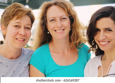 Portrait Of Smiling 40 Years Old Woman Outdoors