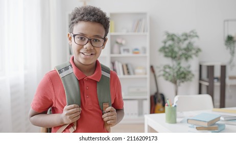 Portrait Of Smiling African American Boy With Backpack, First Day Of School