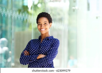 Portrait Of Smiling African Business Woman Outside In City