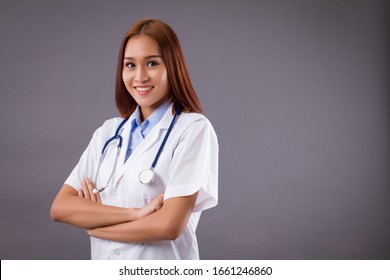 Portrait Of Smiling Asian Woman Doctor Isolated, Confident And Friendly Female Doctor