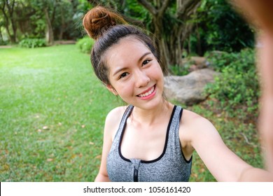 Portrait Of Smiling Beautiful Asian Sport Woman, Happyness Selfie Take A Photo