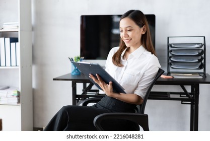 Portrait Of Smiling Beautiful Business Asian Woman Working In Office Use Computer With Copy Space. Business Owner People Sme Freelance Online Marketing E-commerce Telemarketing, Work From Home Concept