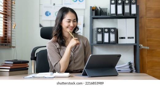 Portrait Of Smiling Beautiful Business Asian Woman Working In Office Use Computer With Copy Space. Business Owner People Sme Freelance Online Marketing E-commerce Telemarketing, Work From Home Concept