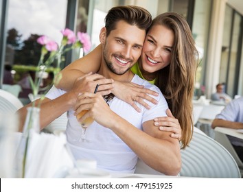 Portrait Of Smiling Beautiful Couple