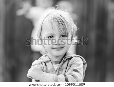 Similar – Small child with long blond hair enjoying of a sunny day