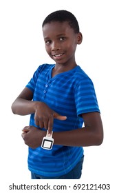 Portrait of smiling boy showing his smart watch