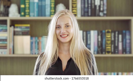 Portrait Of Smiling Business Blonde, White Woman Person Working From Home And Talking To Her Colleagues In Webcam Group Video Call Conference On Internet Online In Quarantine In Corona Virus Pandemic.